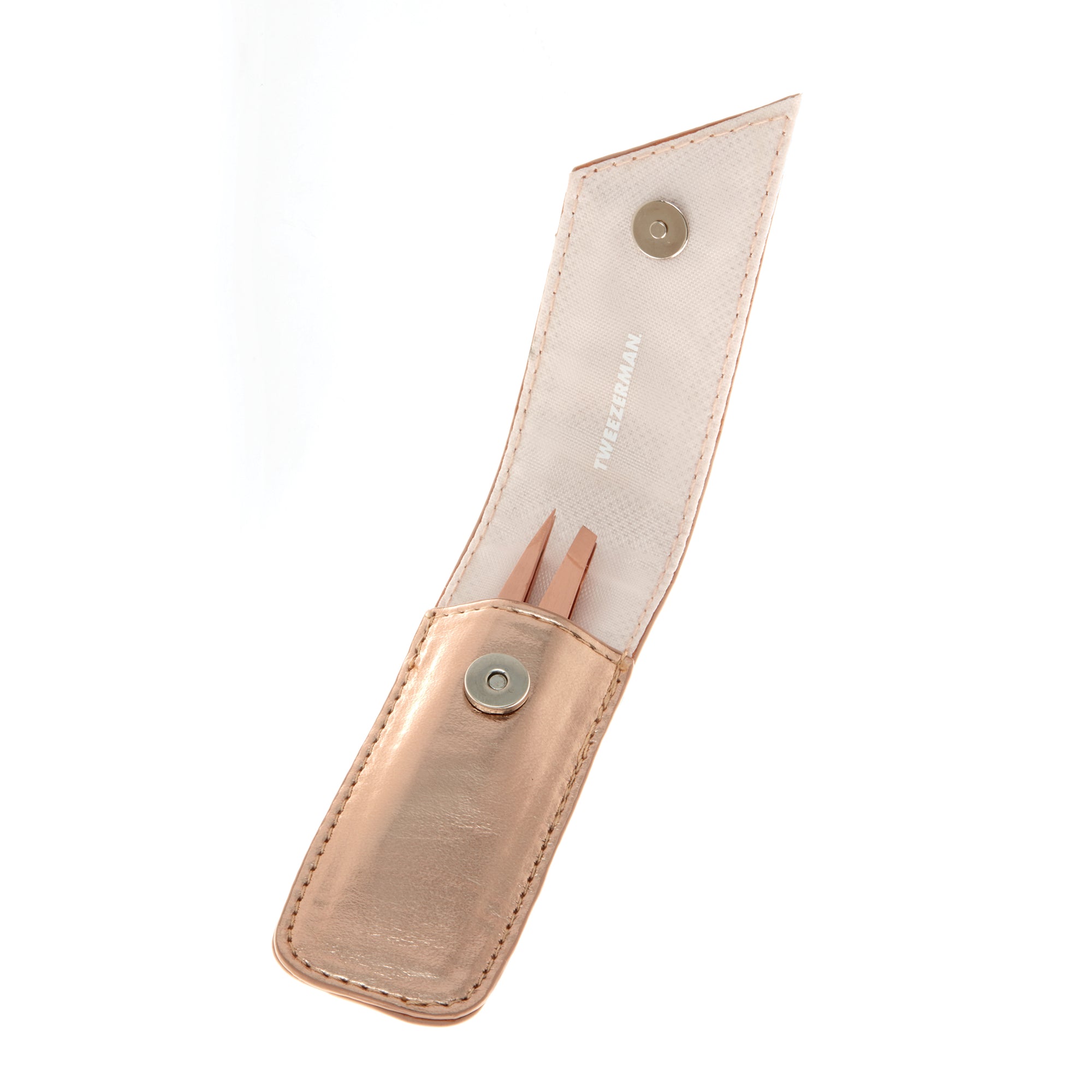 Geöffnetes TWEEZERMAN Petite Set mit schräge und spitzer Pinzette in rose gold in einem Etui.
