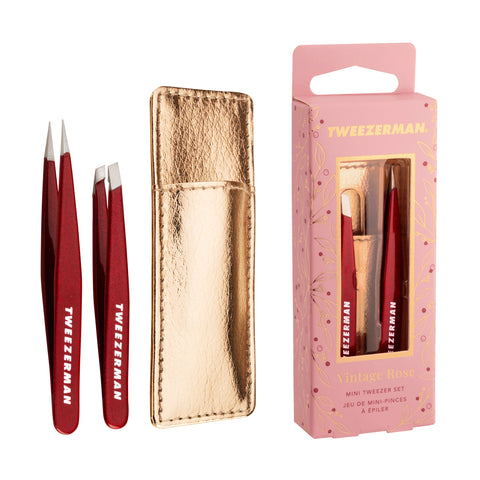 TWEEZERMAN Mini Pinzetten Set bestehend aus einer Schrägen Mini Pinzette und einer Spitzen Mini Pinzette in Dunkelrot mit  goldfarbenen Etui und Geschenkverpackung.