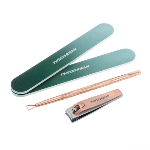 TWEEZERMAN Geschenkset mit verschiedenen Produkten aus rostfreiem Edelstahl speziell für die Nagelpflege in rose gold.