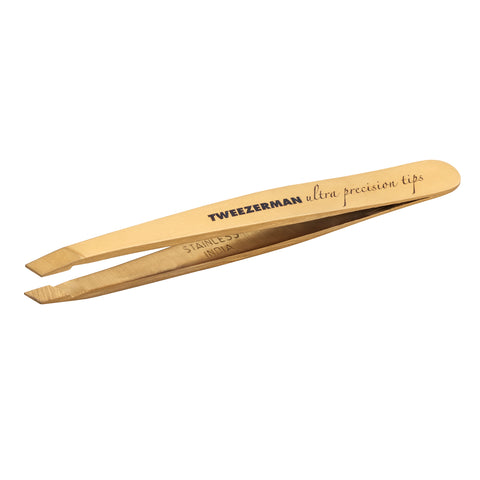 TWEEZERMAN Mini schräge Pinzette  aus rostfreiem Edelstahl mit spezieller Beschichtung in gold.